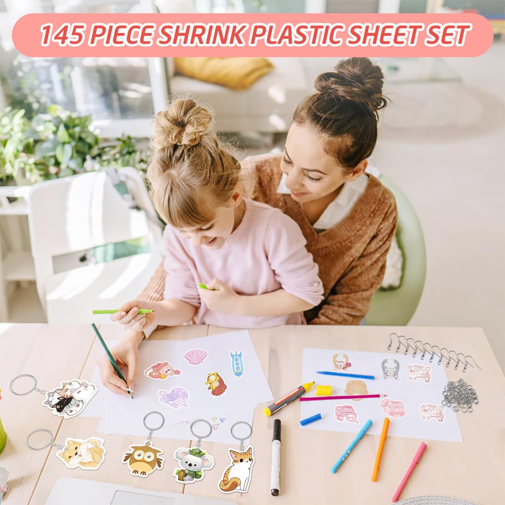 PATPAT 145Pieces Shrink Plastic Sheet Kit with Multi Shrinky Art Paper & 100 Pcs Metal Hooks and Keyrings Kit DIY Cartoon Keychain Bag Charms Accessories DIY Heat Shrink Craft Kit for Kids and Adults