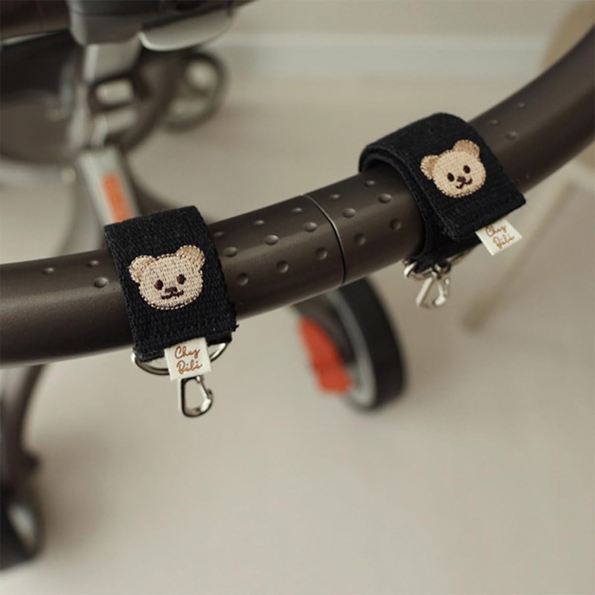 SNOWIE SOFT stroller hooks for hanging bags featuring metal carabiner and cotton straps | adjustable bear design 2 pack