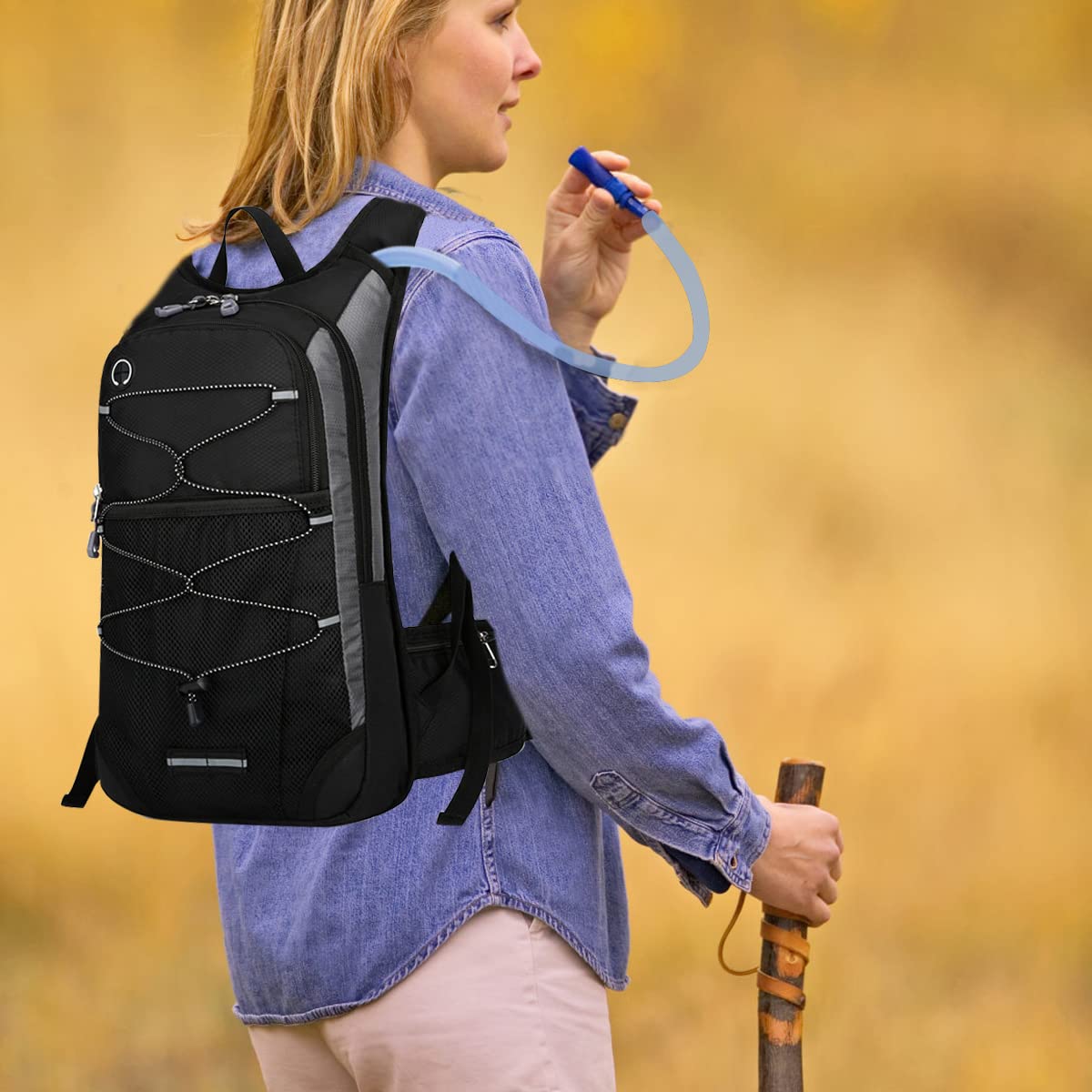 GUSTAVE Hydration Backpack for Hiking and Cycling with 2L BPA Free Bladder | Lightweight Waterproof Design