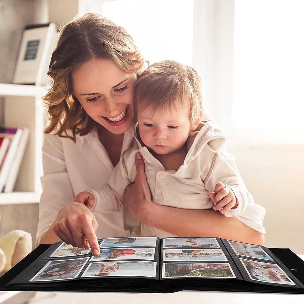 HASTHIP Photo Album Book for Memories with 500 Photo Capacity featuring 4 Clear Windows and PU Leather Cover