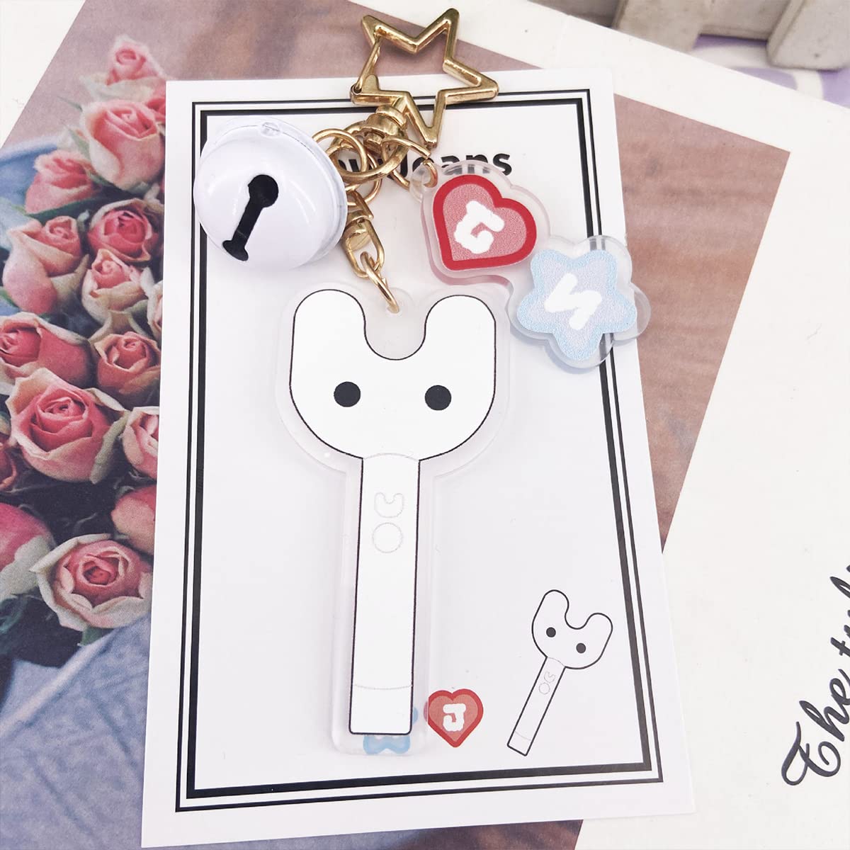 SANNIDHI Newjeans Keychain featuring Acrylic NJ Icon Bell and Light Stick Charms for Fans