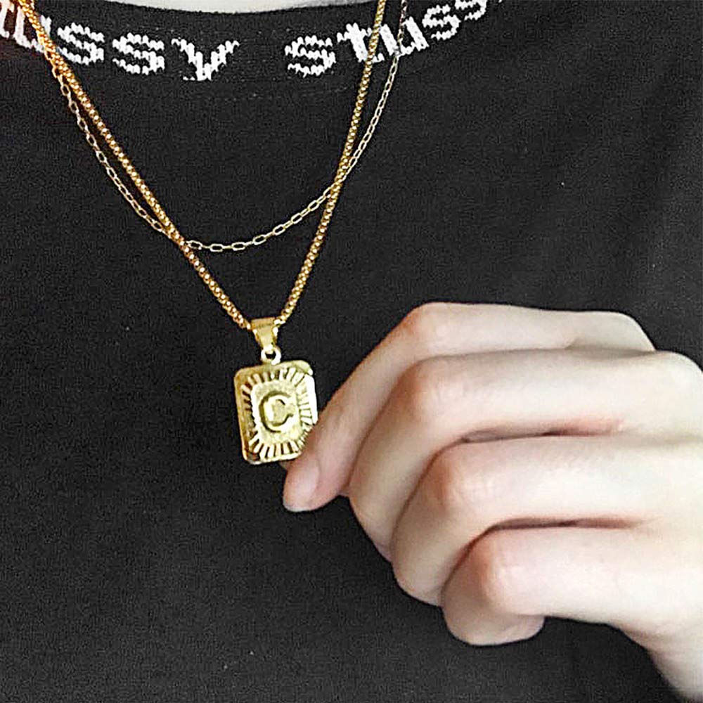 SANNIDHI Pendant Necklace for Men and Women with 0.78×0.62 in A Letter Charm | Golden Titanium Steel 20 in Chain