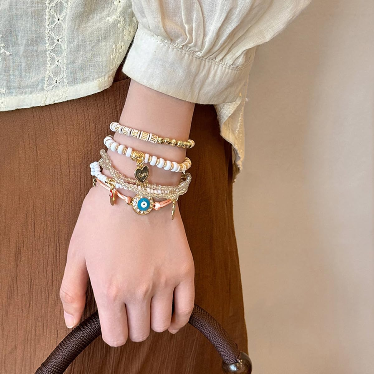 SANNIDHI Boho Stackable Multilayer Bracelet Set with Evil Eye Charm | Pack of 6 for Women
