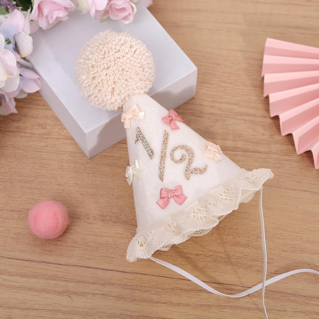 HANNEA® 1/2 Birthday Party Hat for Baby, Half Birthday Felt Crown with Pom Pom & Lace Trim, Soft Baby-Safe 6 Month Milestone Hat with Elastic Chin Strap for Photoshoot & Celebration.