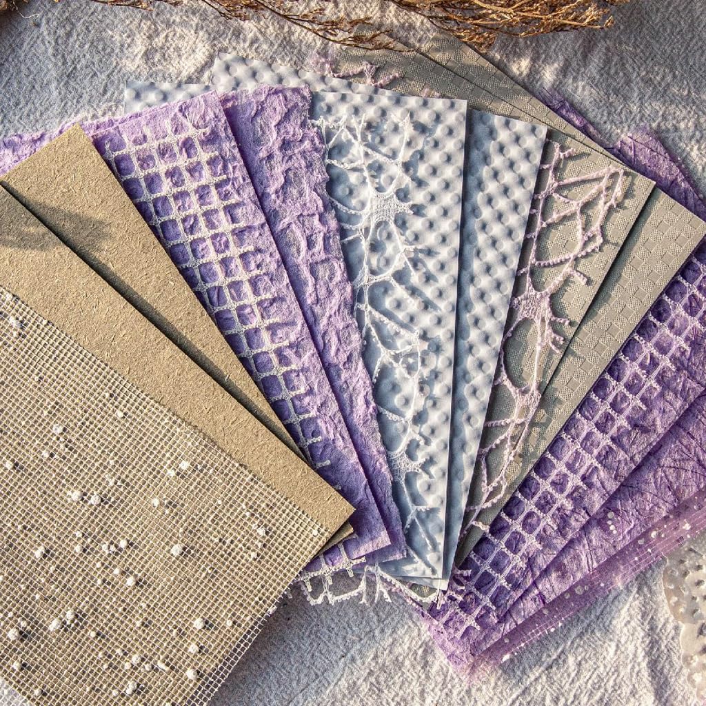 HASTHIP Scrapbook Paper Set for Journaling and Card Making featuring 16pcs 10x14cm Textured Sheets | Assorted Beige White and Purple Designs