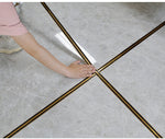 HASTHIP 5M Black Golden Floor Tiles Stickers, Waterproof Tile Gap Tape, PVC Self Adhesive Tape Ceramic Tile Gap Tape for Detailing Walls, Floor Tile Gap, Cabinetry (2.5CM Width *5M Long)